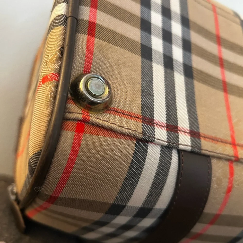 Burberrys Haymarket Boston Tan Duffel with Brown Leather Trim 10H x 19W inches